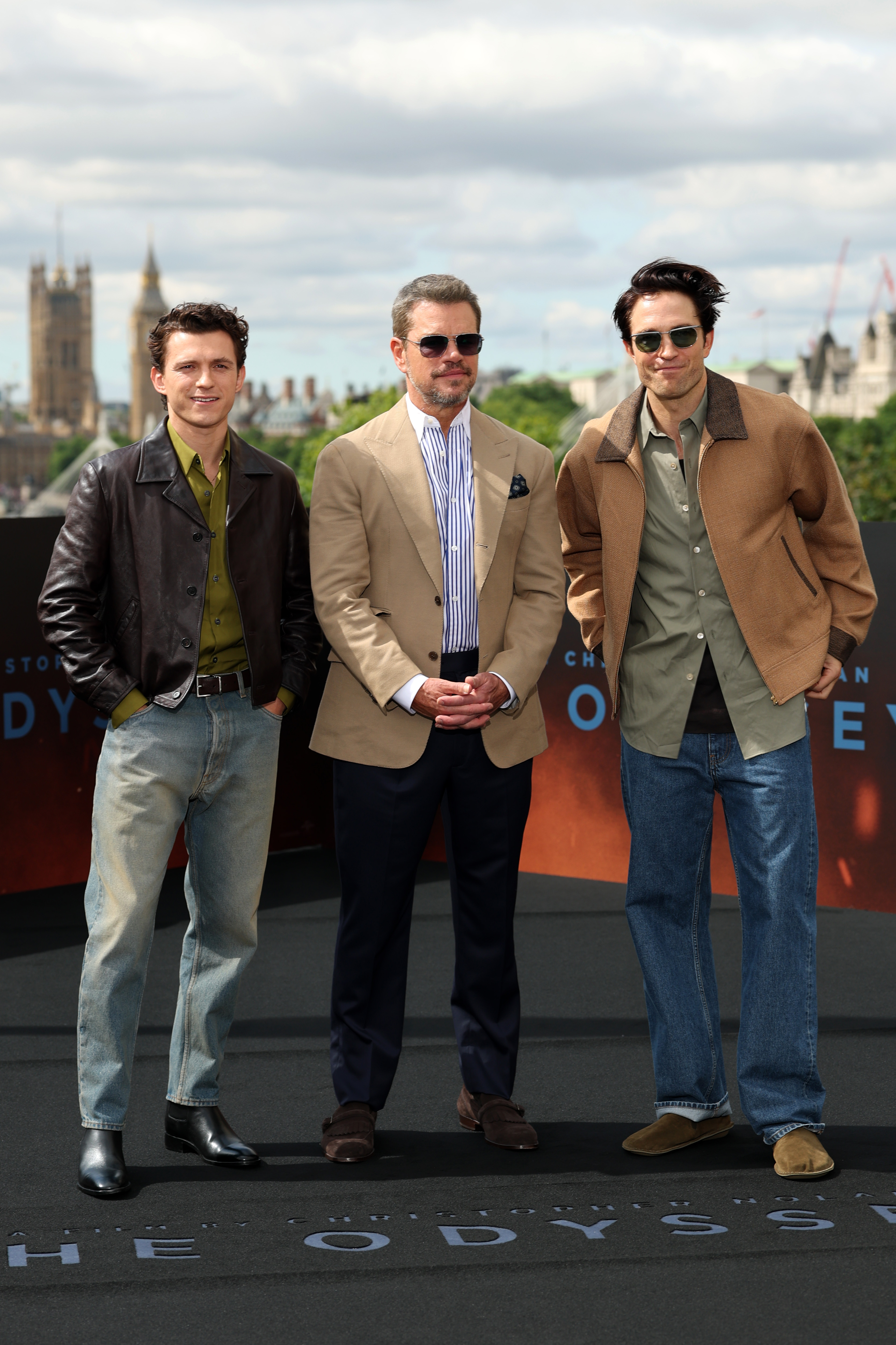 Tom Holland, Matt Damon and Robert Pattinson pose at the London Photocall for "The Odyssey"